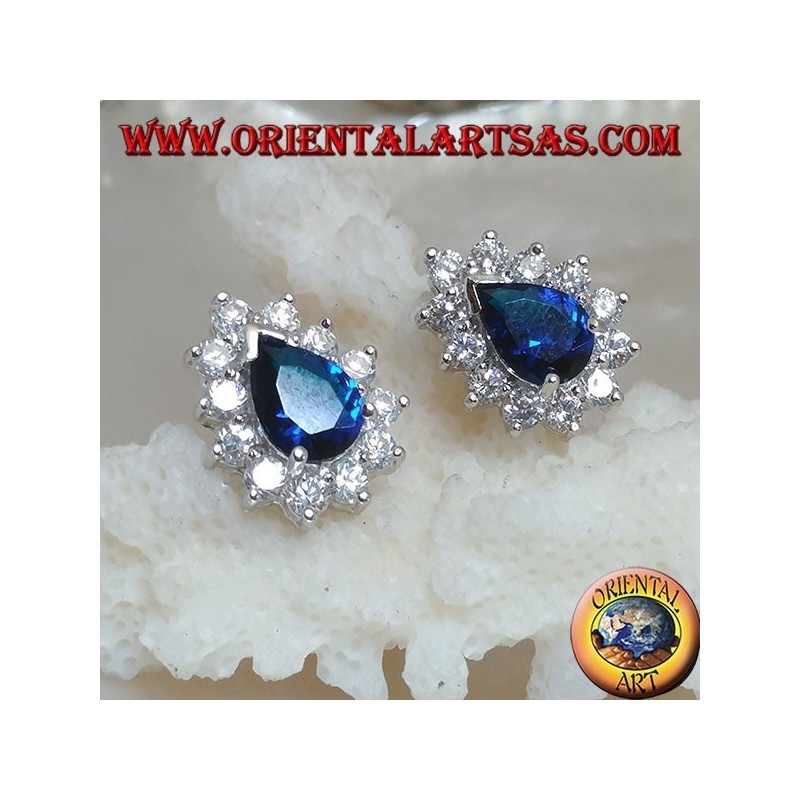 Silver lobe earrings with synthetic teardrop sapphire surrounded by zircons