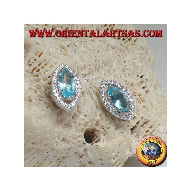 Boucles d'oreilles Lobe Shuttle en argent avec topaze bleue naturelle entourées de zircons