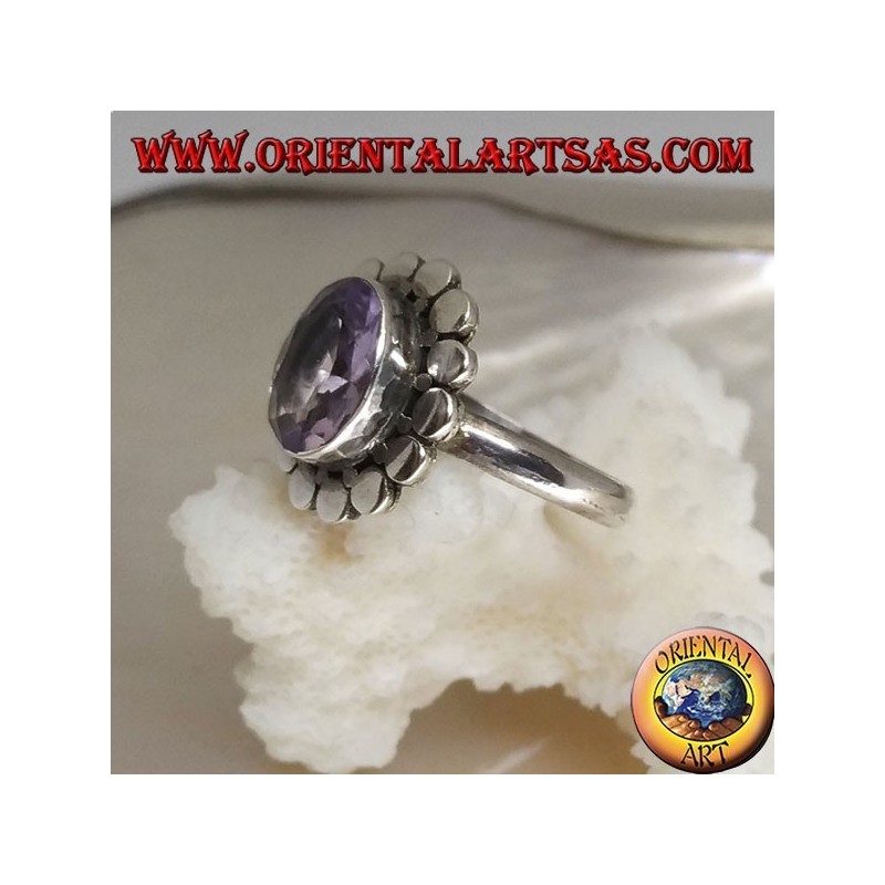 Silver ring with natural oval faceted amethyst surrounded by discs