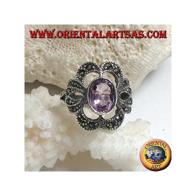 Silver ring with oval natural amethyst on a pierced bow setting studded with marcasite