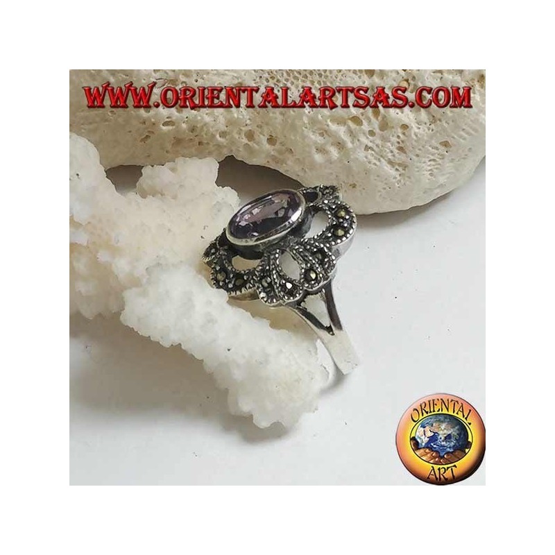 Silver ring with oval natural amethyst on a pierced bow setting studded with marcasite