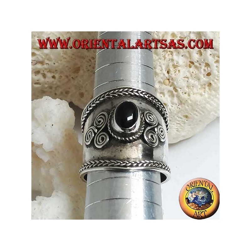 Wide band silver ring with oval onyx and spiral triskéll on the sides, Bali