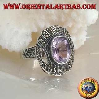 Silver ring with oval natural amethyst on a striped setting studded with marcasite
