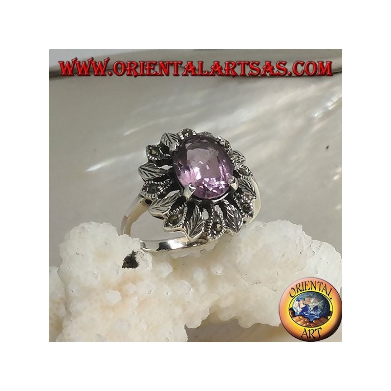 Silver ring with oval natural amethyst set surrounded by silver and marcasite leaves