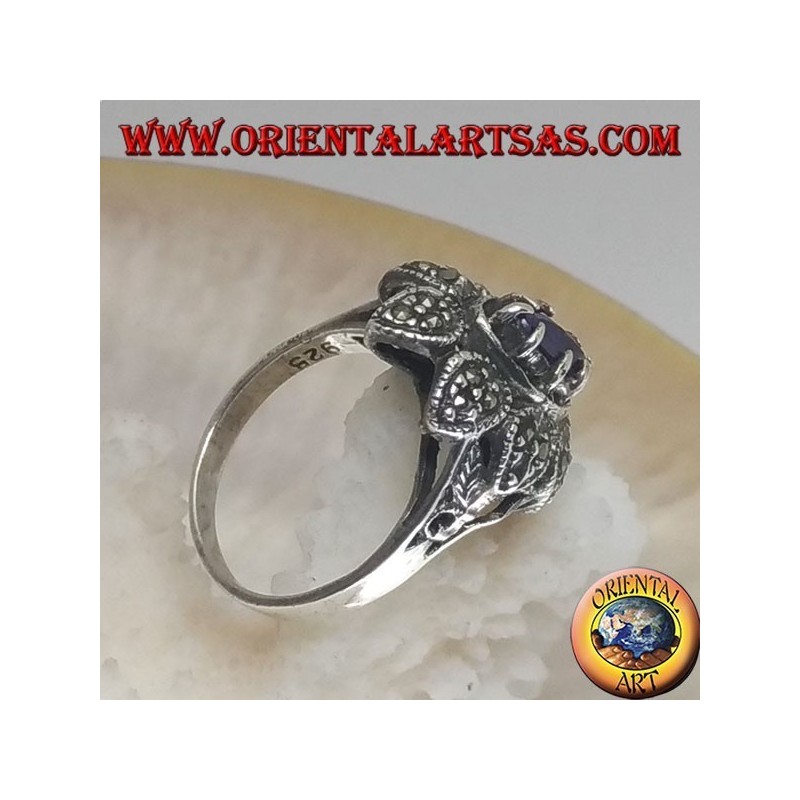 Bague fleur en argent avec navette centrale zircon couleur améthyste et pétales de marcassite