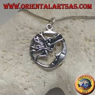Silver pendant fairy flying in front of the moon in the circle