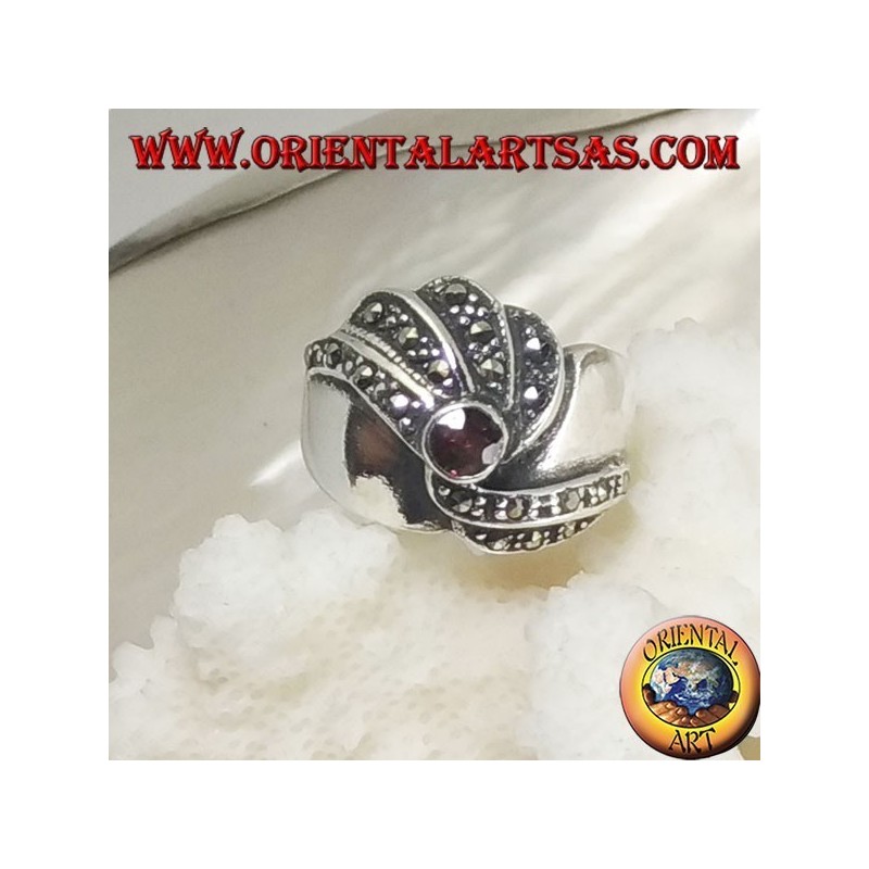 Silver ring with round garnet and concentric spiral marcasite rows