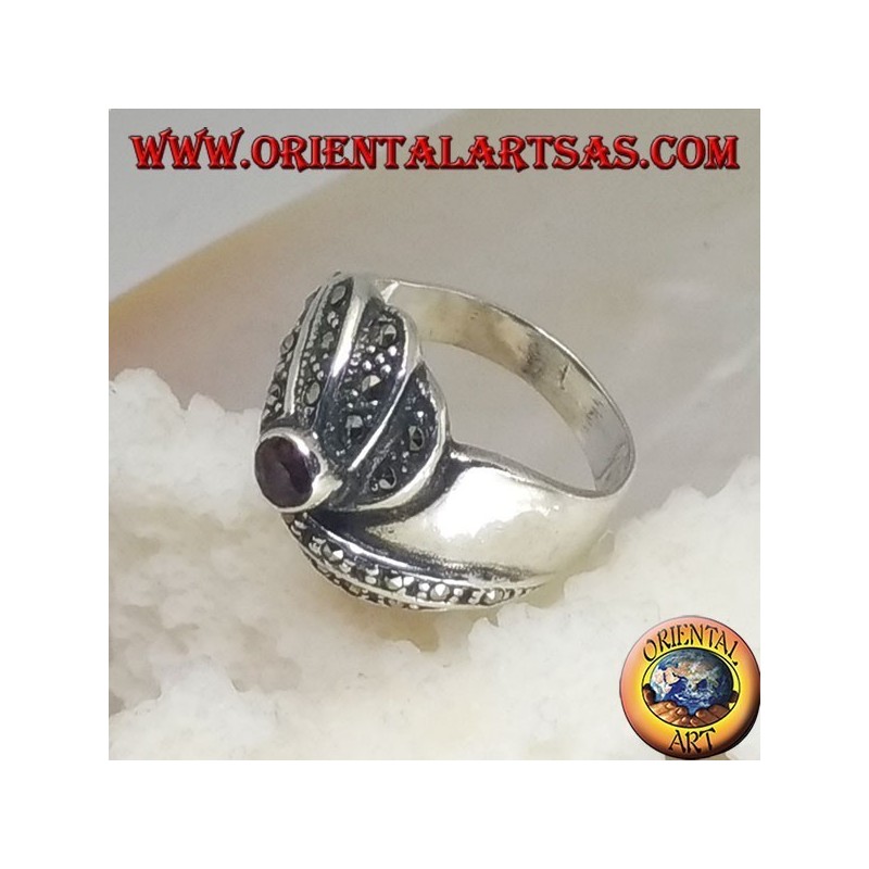Silver ring with round garnet and concentric spiral marcasite rows