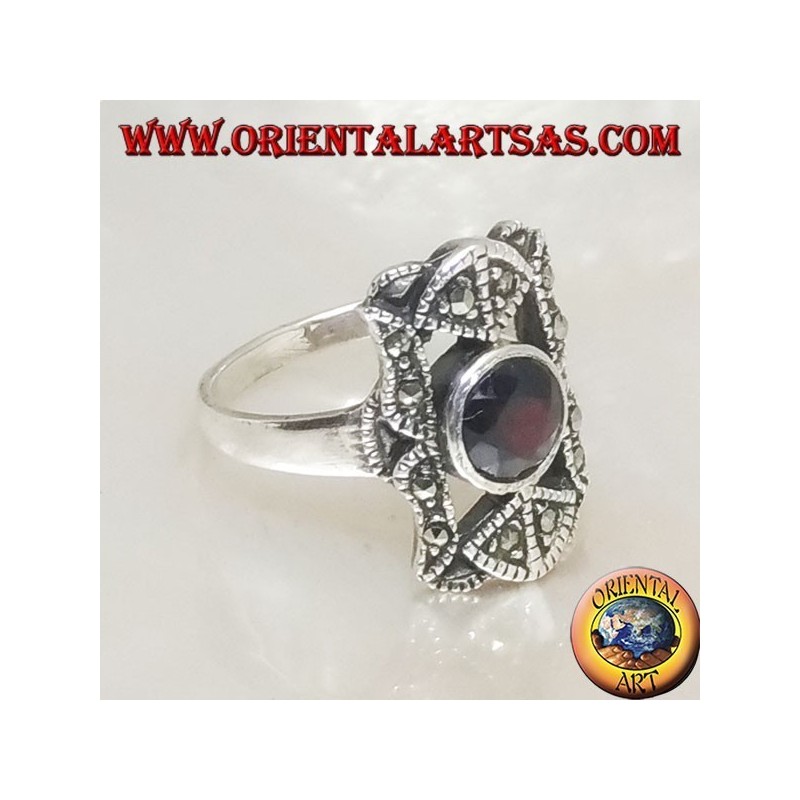 Silver ring with round natural garnet in a perforated rectangle with marcasites