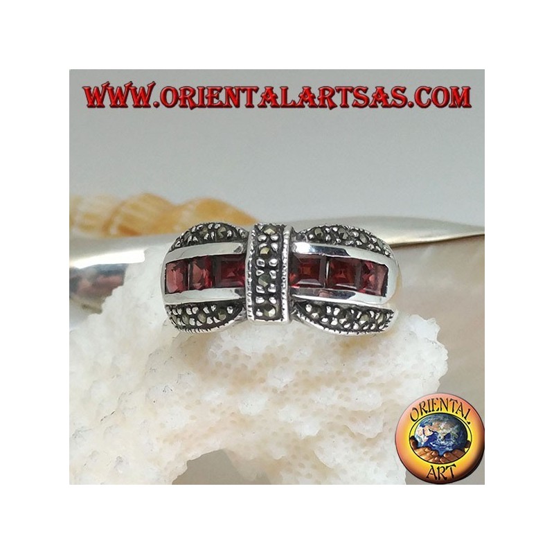 Silver bow tie ring with a row of square garnet and marcasite garnishes