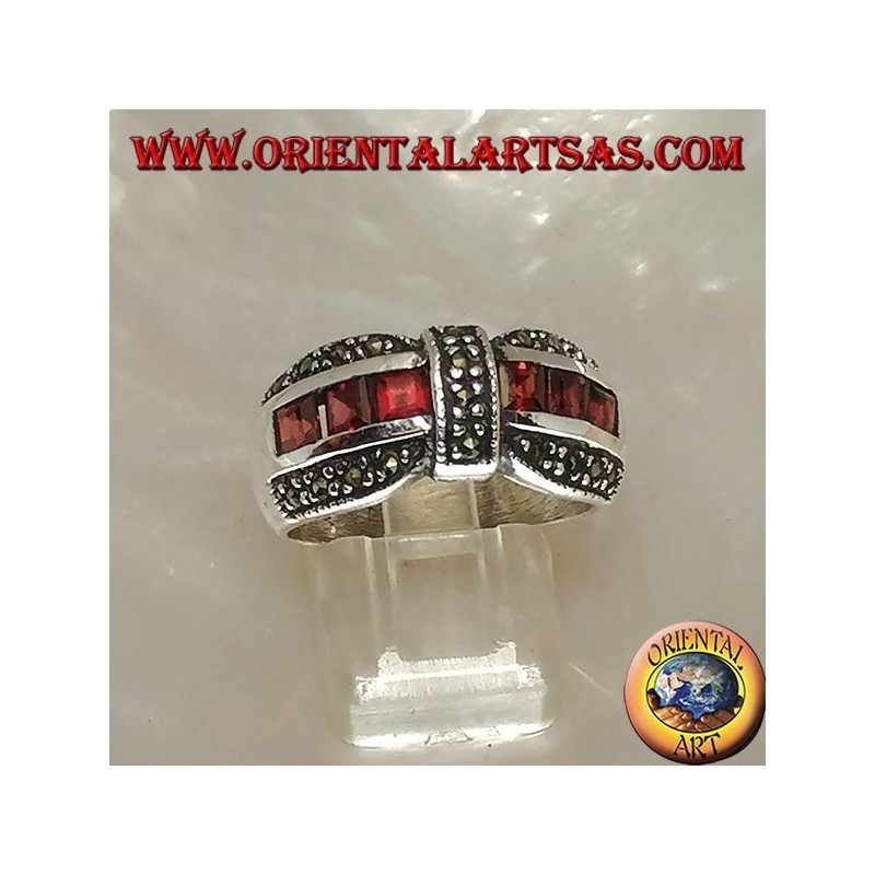 Silver bow tie ring with a row of square garnet and marcasite garnishes