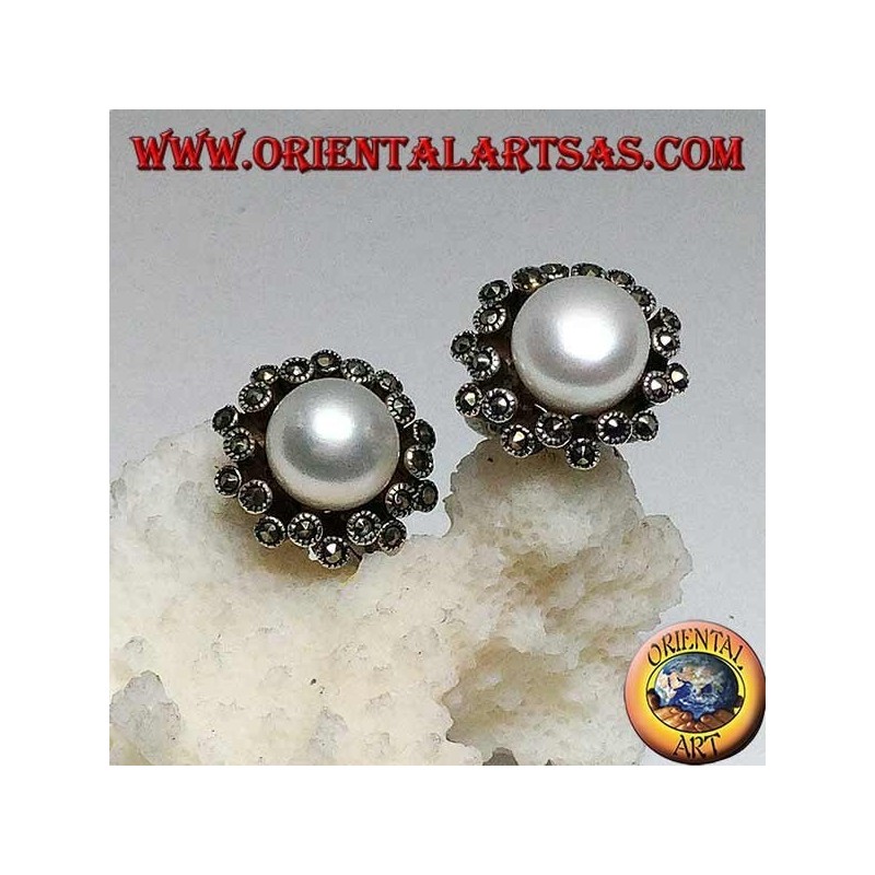 Lever-lock silver earrings with freshwater pearl surrounded by two alternating lines of marcasite