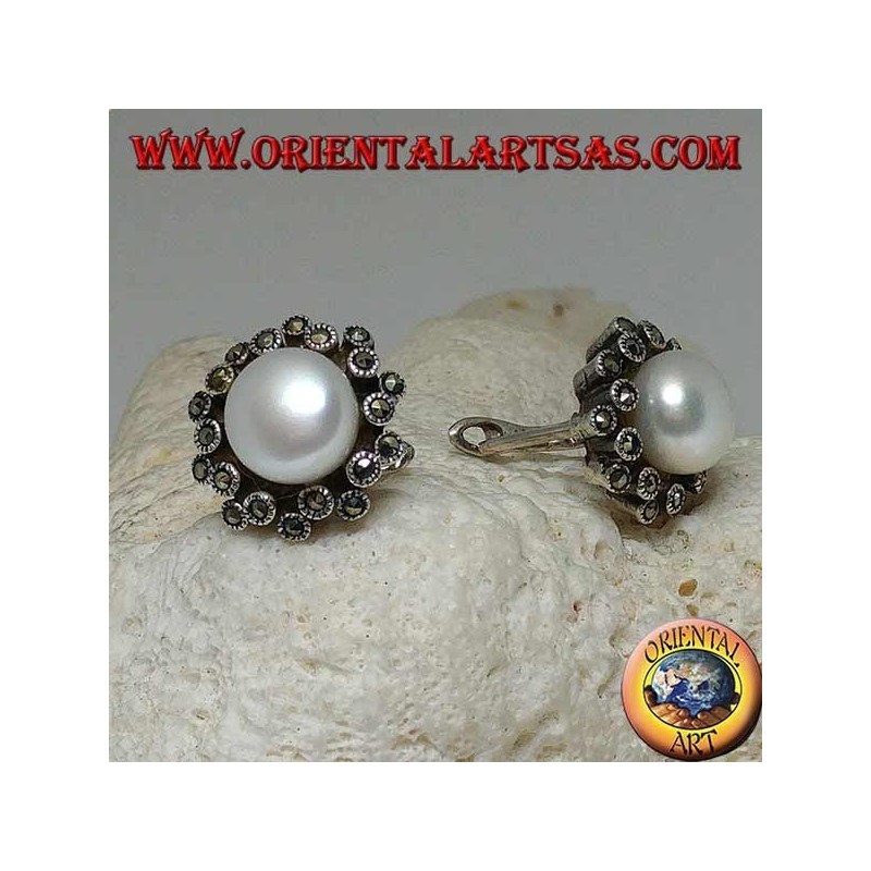 Lever-lock silver earrings with freshwater pearl surrounded by two alternating lines of marcasite