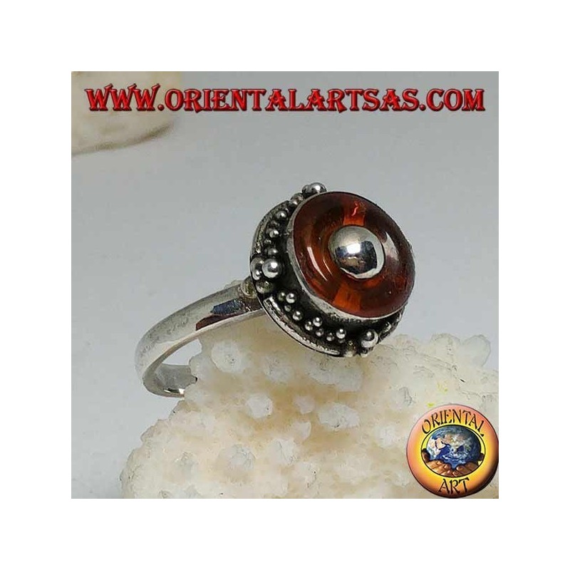 Bague en argent avec disque d'ambre naturel et boule centrale