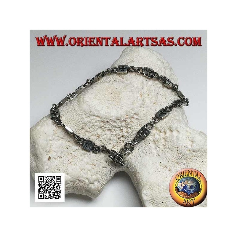 Bracciale in argento morbido piastrine con croci incise in bassorilievo alternate ad anellini