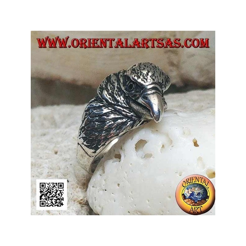 Silver ring with three-quarter pecking eagle head