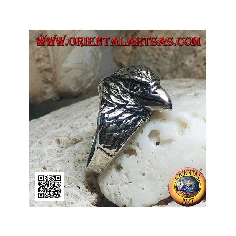 Bague en argent avec tête d'aigle picorant trois quarts