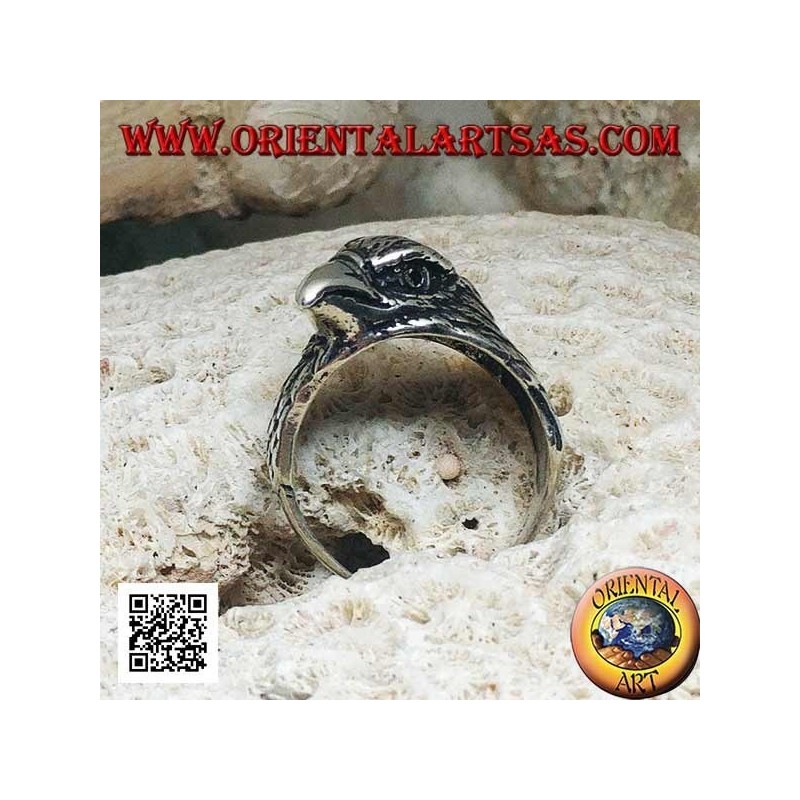 Anello in argento testa di aquila beccante a tre quarti