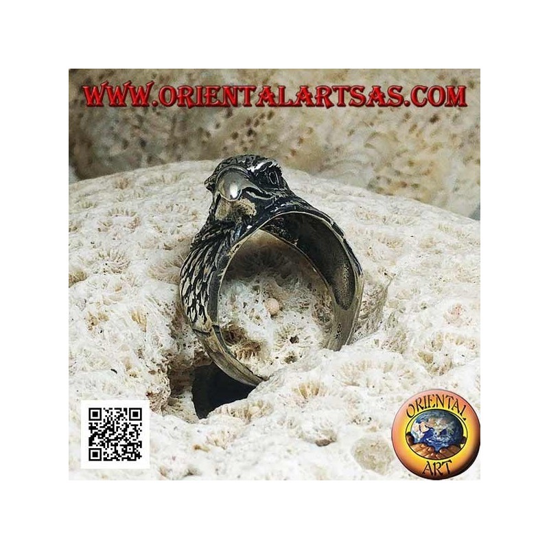 Anello in argento testa di aquila beccante a tre quarti