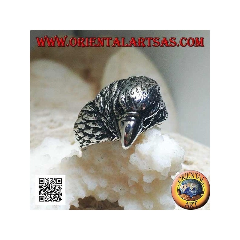 Bague en argent avec tête d'aigle picorant trois quarts