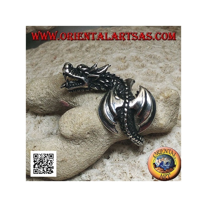 Anello in argento, drago viverna in volo e testa inclinata