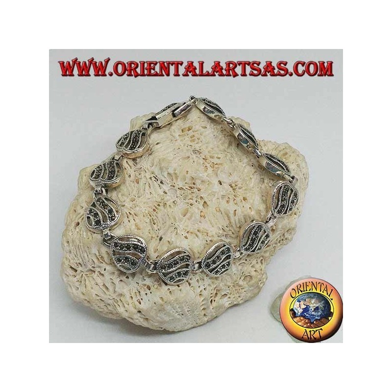 Silver bracelet with 11 openwork hearts with two wavy lines studded with marcasite