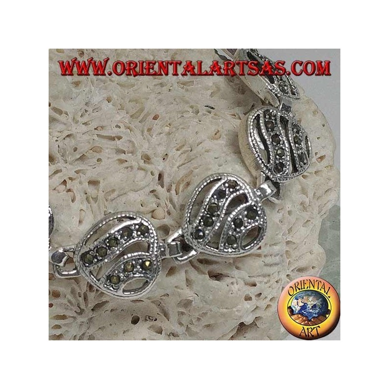 Pulsera de plata con 11 corazones calados con dos líneas onduladas tachonadas con marcasita