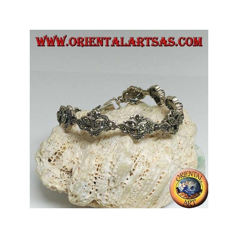 Pulsera de plata con 9 entrelazados de hojas tachonadas con marcasita.