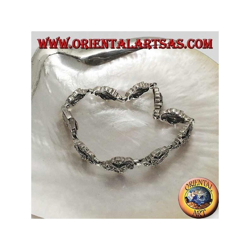 Silberarmband mit 9 ineinander verschlungenen Blättern mit Markasit besetzt