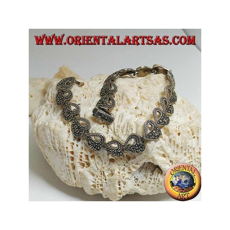 Pulsera de plata con 18 corazones medio perforados y medio tachonados con marcasita