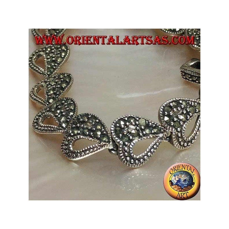 Bracelet en argent avec 18 coeurs mi-percés et mi-cloutés de marcassite