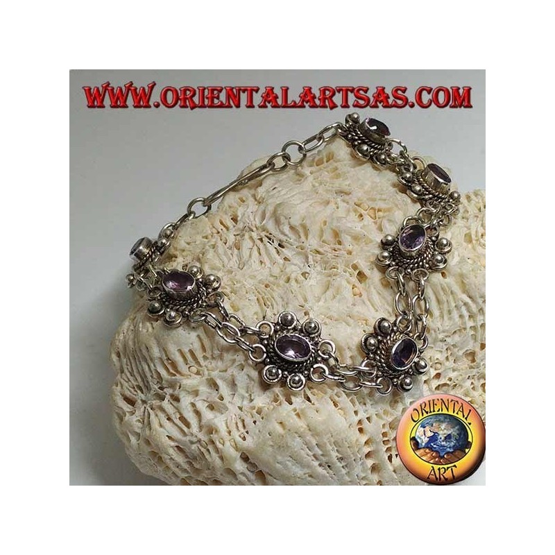 Silver bracelet with two rows of rings with 7 handmade natural oval amethysts