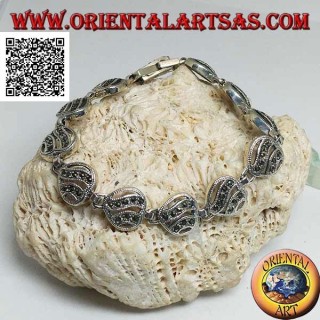 Silver bracelet with 11 openwork hearts with two wavy lines studded with marcasite