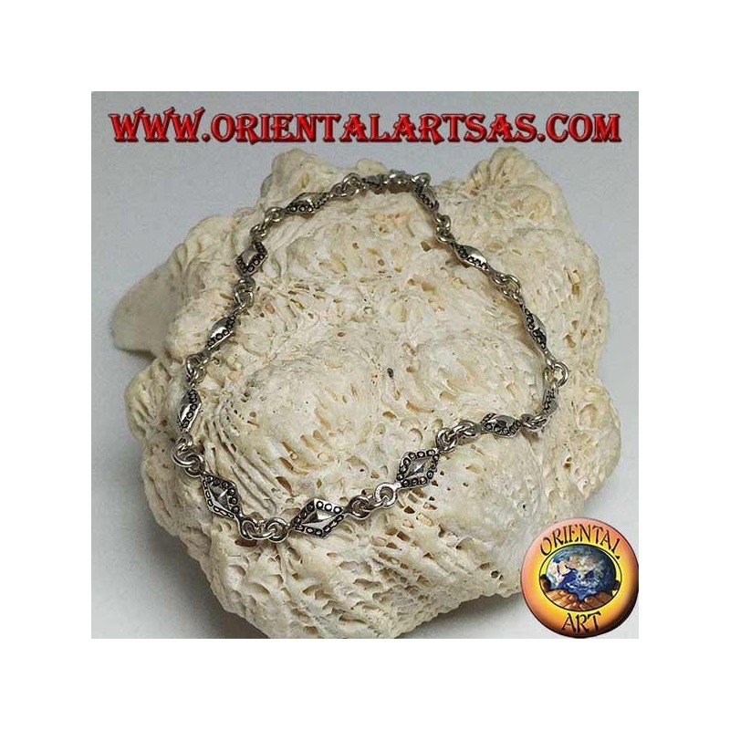 Bracelet en argent tendre avec des plaques rhomboïdes aux contours pointillés