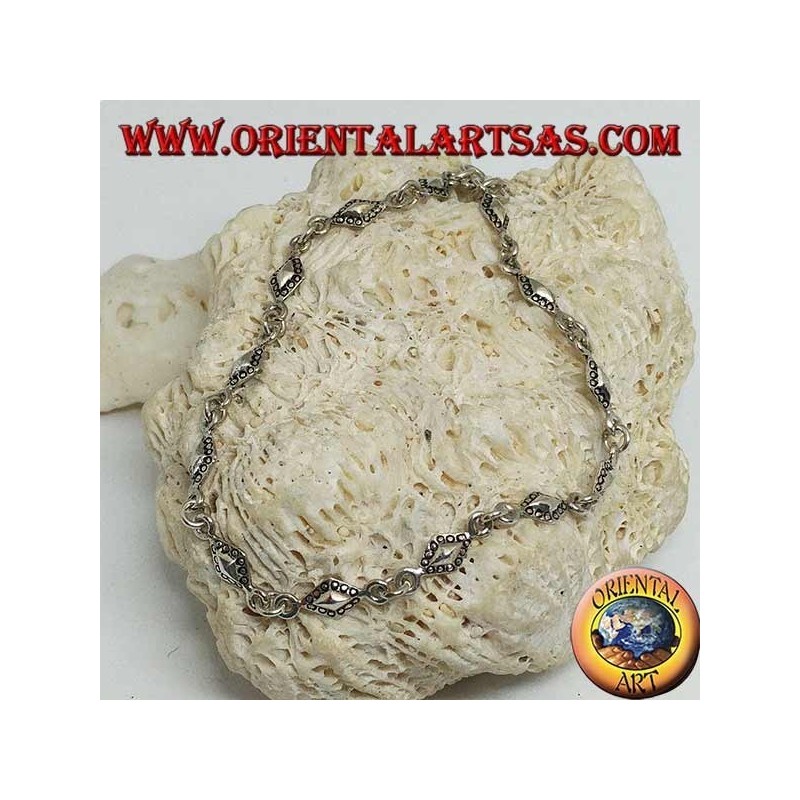 Bracelet en argent tendre avec des plaques rhomboïdes aux contours pointillés
