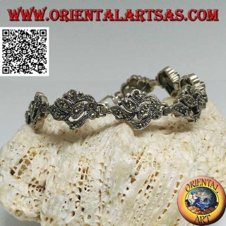 Pulsera de plata con 9 entrelazados de hojas tachonadas con marcasita.