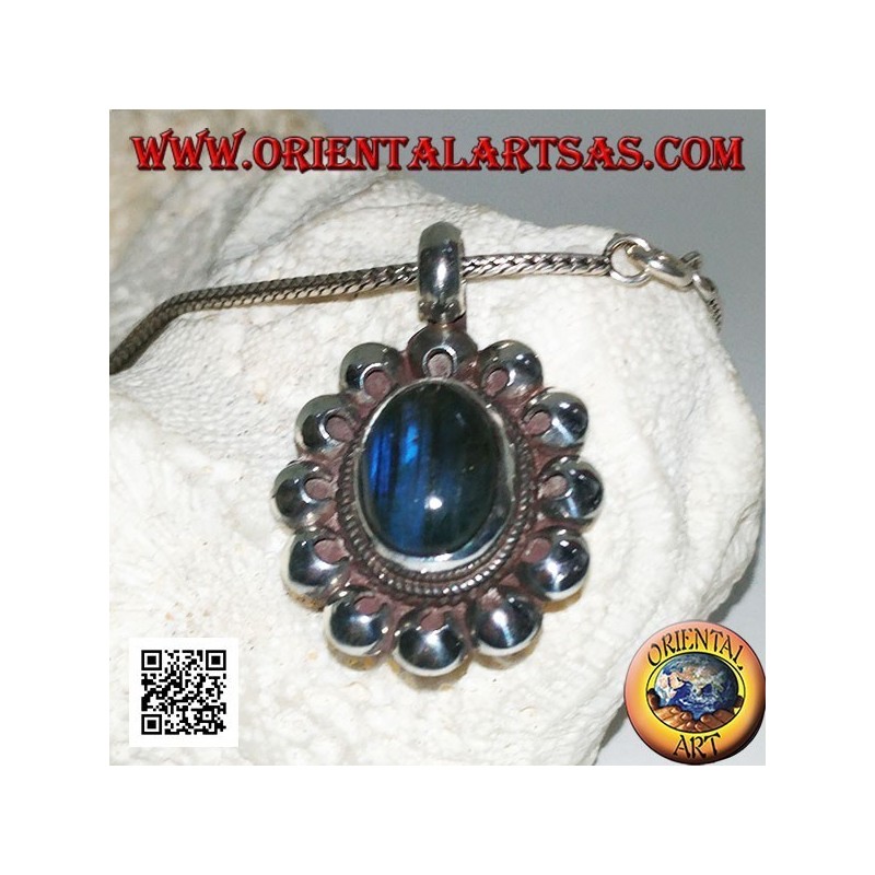 Silver pendant with oval blue fluorescent labradorite cabochon surrounded by perforated discs