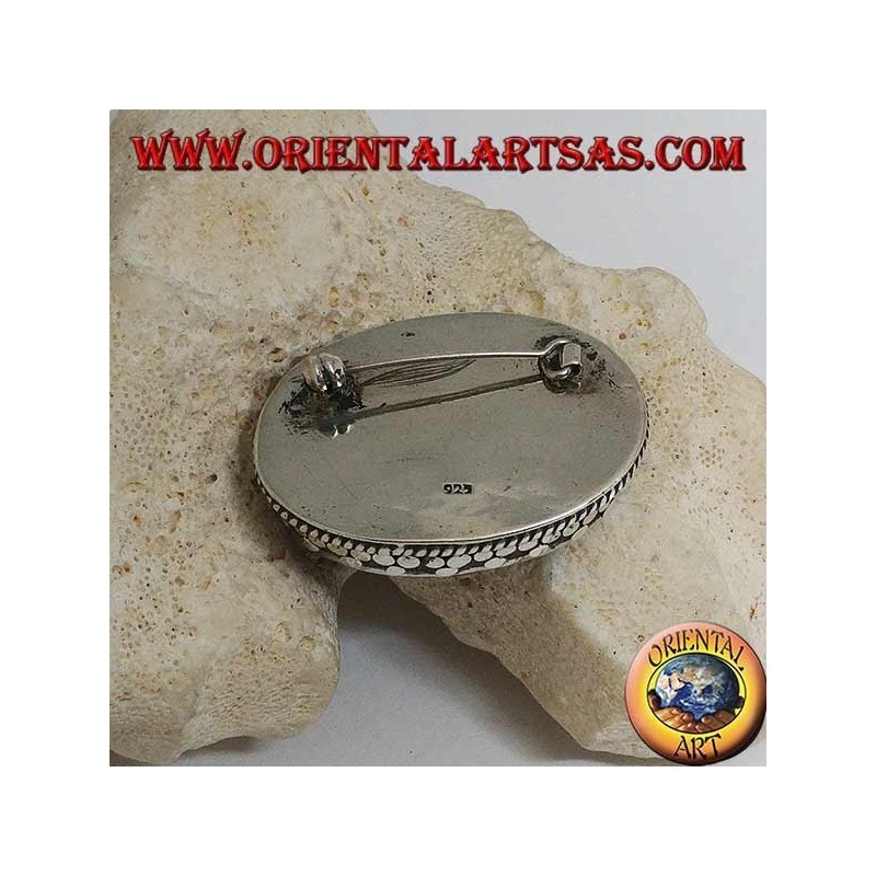 Broche de plata con lapislázuli natural ovalado grande rodeado de entrelazados y tris de bolas