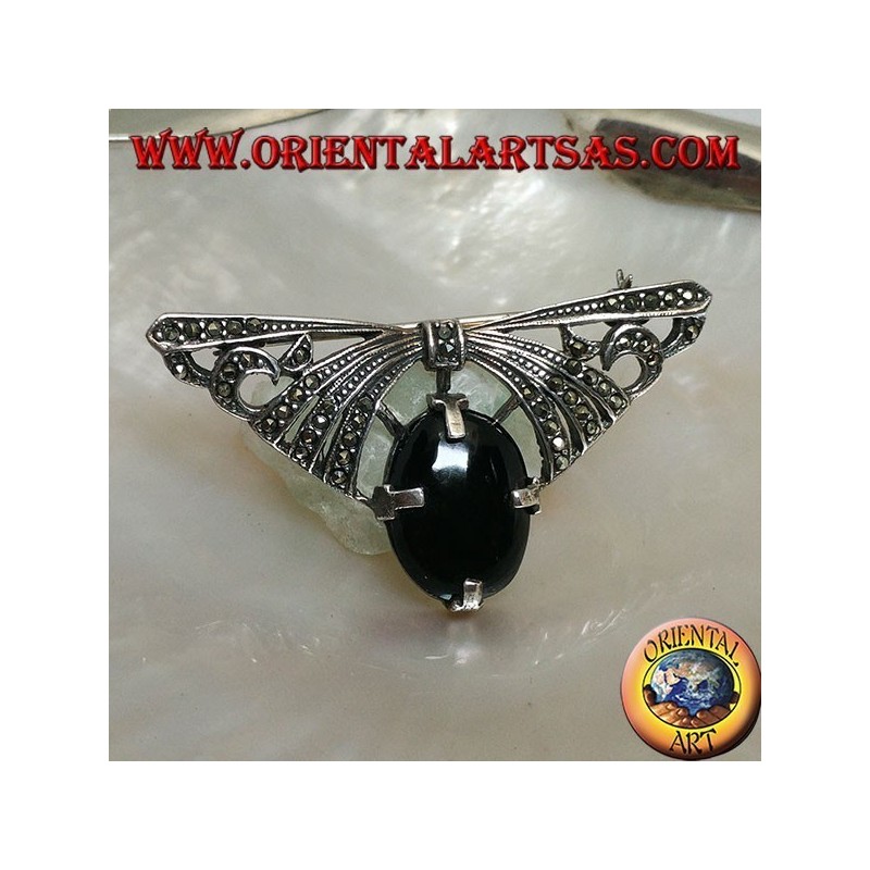 Broche en argent en forme d'arc clouté de marcassite avec onyx ovale serti dessous