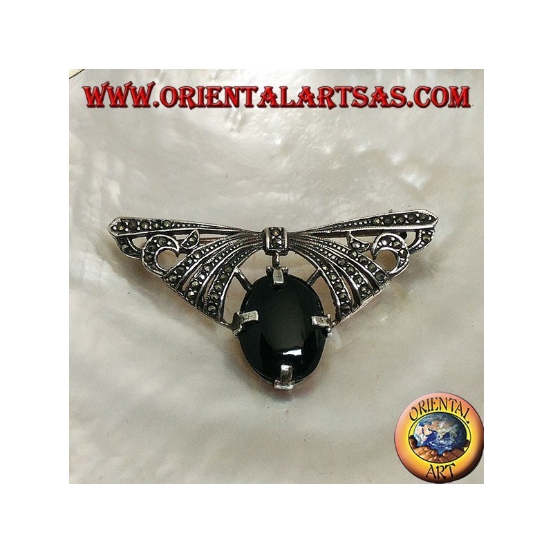 Silver brooch in the shape of a bow studded with marcasite with oval onyx set below