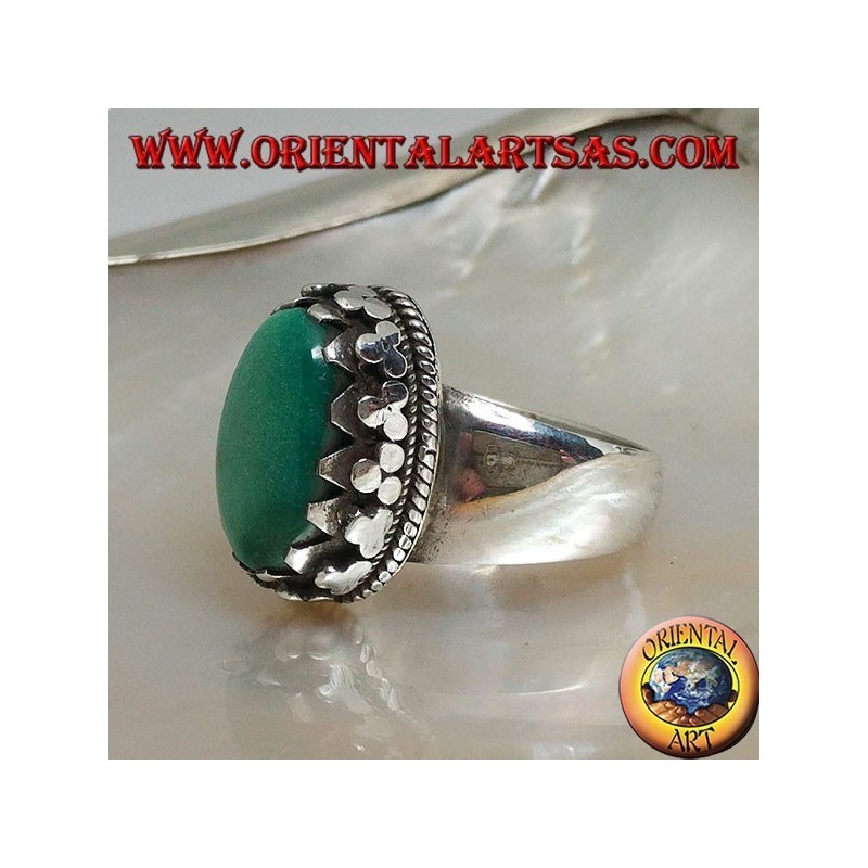 Anello in argento con turchese ovale antico Tibetano naturale incastonato da dischetti con intreccio laterale