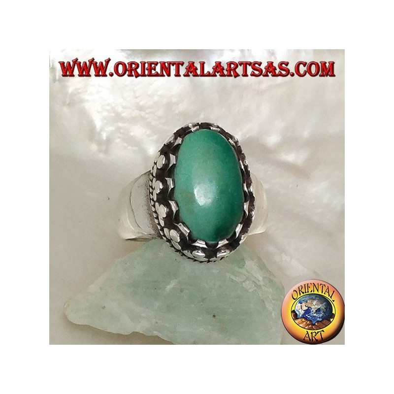 Anello in argento con turchese ovale antico Tibetano naturale incastonato da dischetti con intreccio laterale