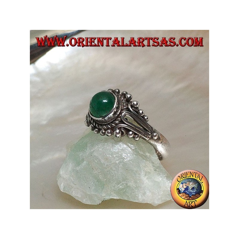 Silver ring with round green cabochon agate surrounded by interweaving and balls decoration