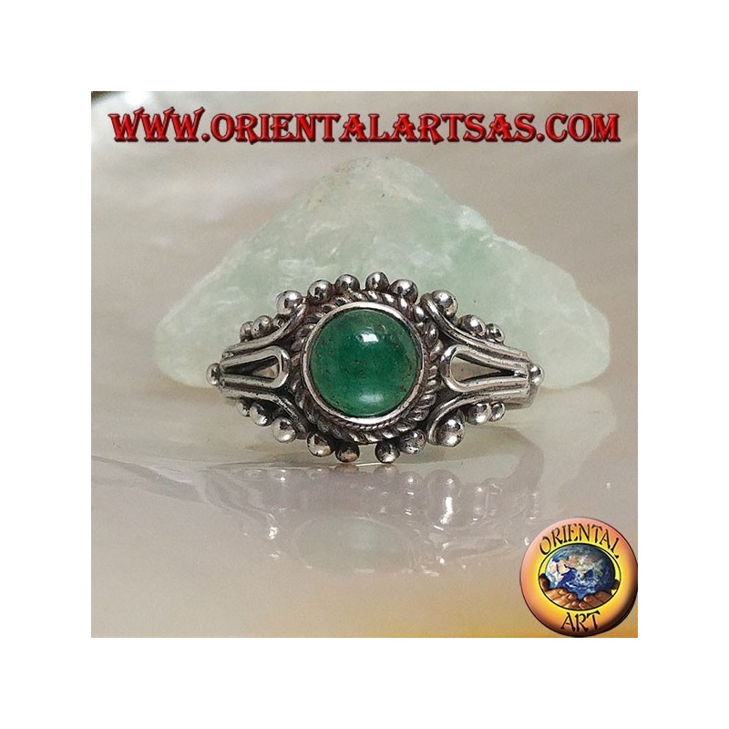 Silver ring with round green cabochon agate surrounded by interweaving and balls decoration