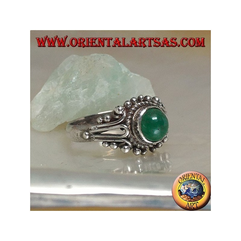 Silver ring with round green cabochon agate surrounded by interweaving and balls decoration