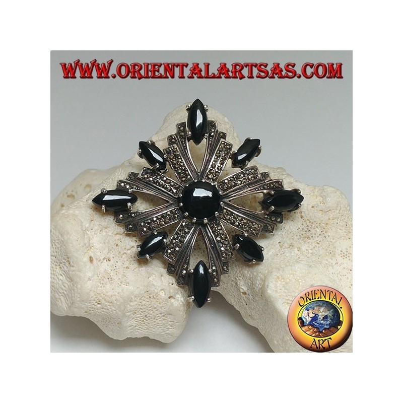 Silver brooch with Celtic cross studded with marcasite surrounded by shuttle onyxes and a central round