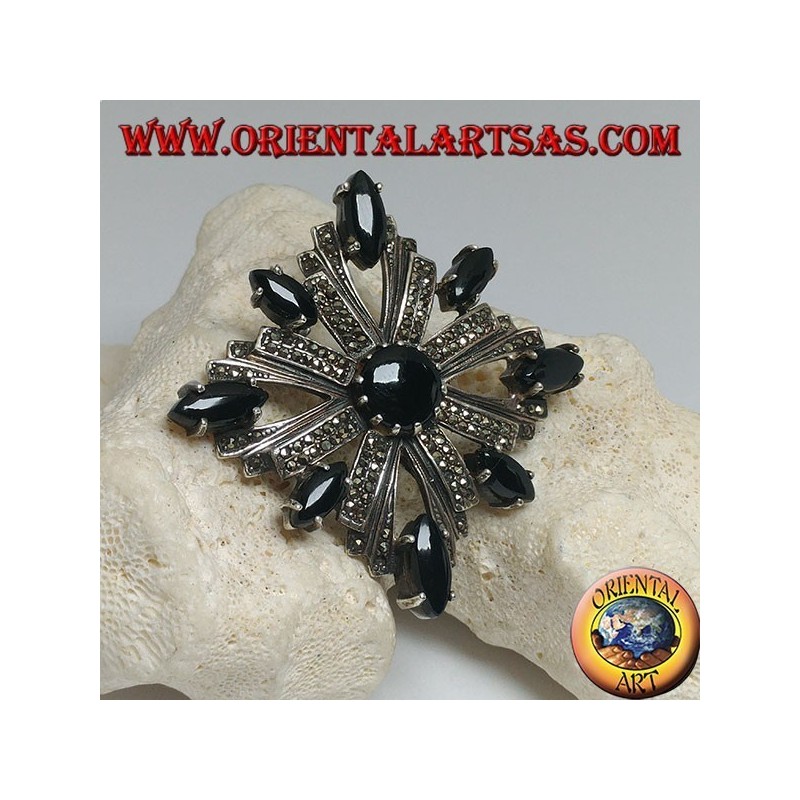 Silver brooch with Celtic cross studded with marcasite surrounded by shuttle onyxes and a central round