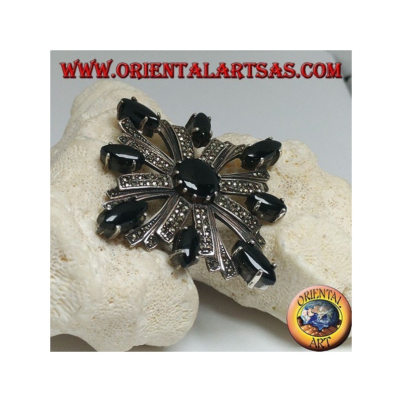 Silver brooch with Celtic cross studded with marcasite surrounded by shuttle onyxes and a central round