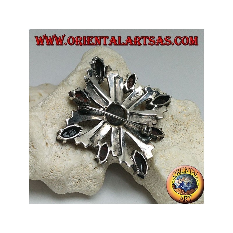 Silver brooch with Celtic cross studded with marcasite surrounded by shuttle onyxes and a central round