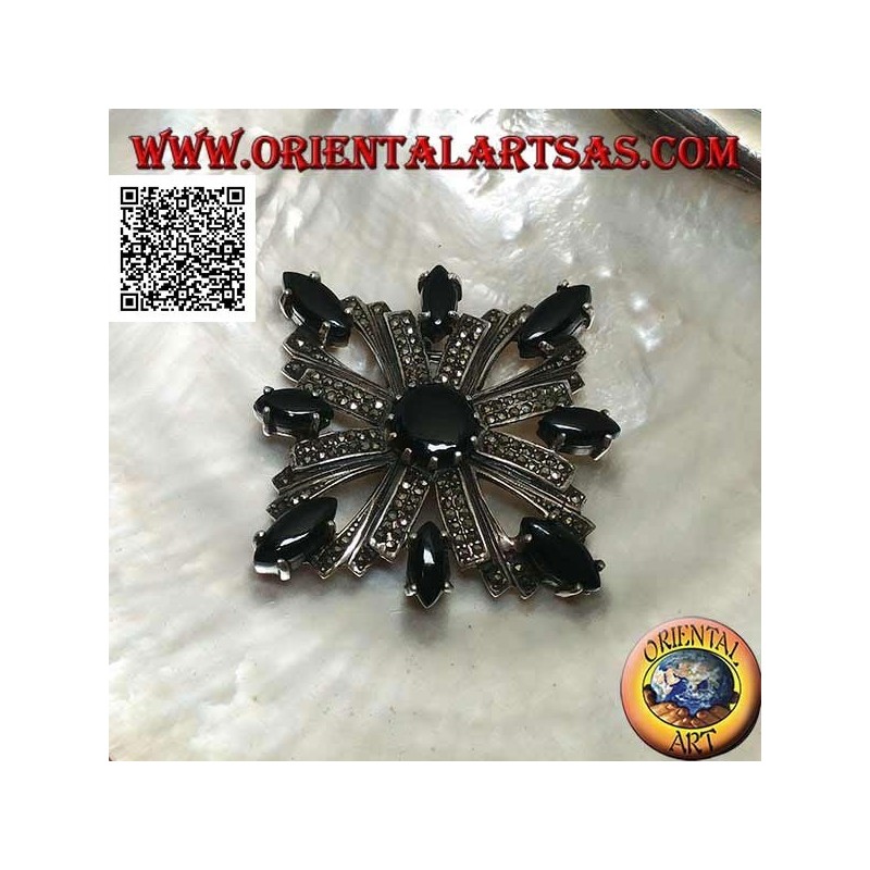 Silver brooch with Celtic cross studded with marcasite surrounded by shuttle onyxes and a central round